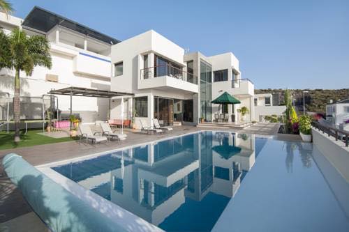 Villa con piscina privada climatizada en Casa Flamboyant